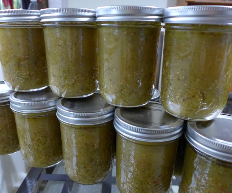 jars of fresh-made Mexican green tomatillo enchilada sauce